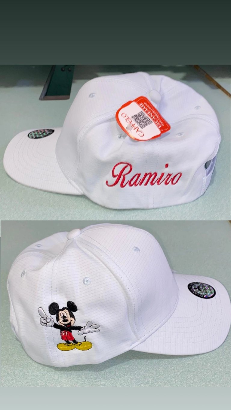 White Ramiro baseball cap with red scripted logo and Mickey Mouse embroidery shown from multiple angles with price tag attached