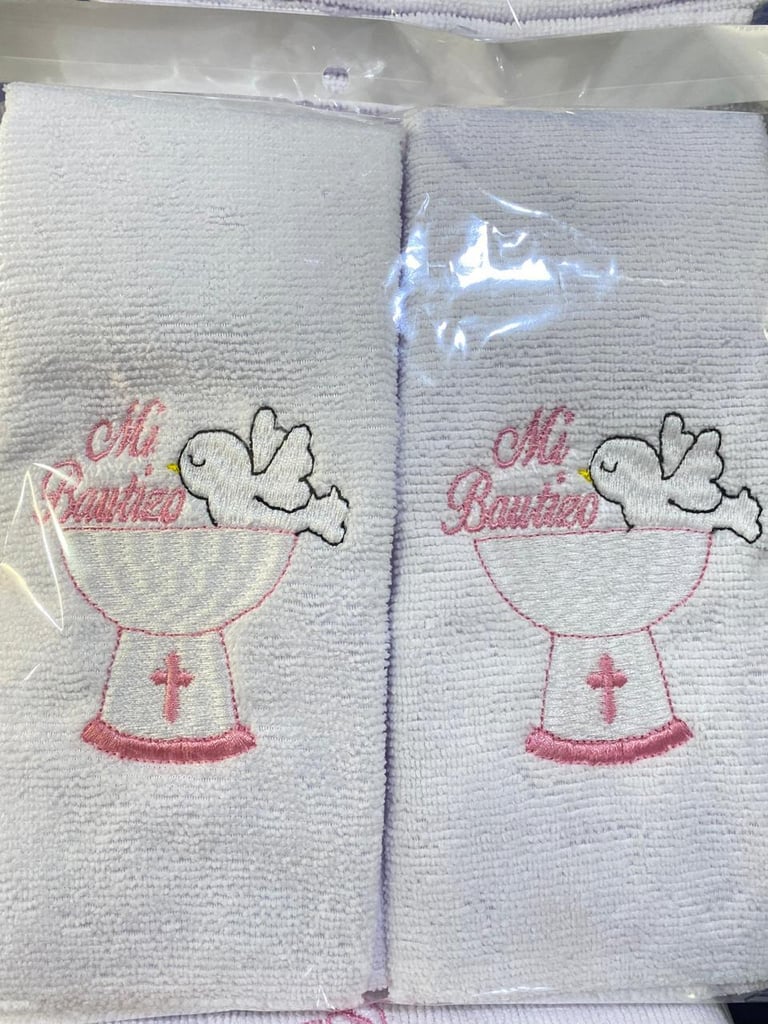 Pair of white and pink embroidered hand towels with angel design and Oh Blessed text, packaged together